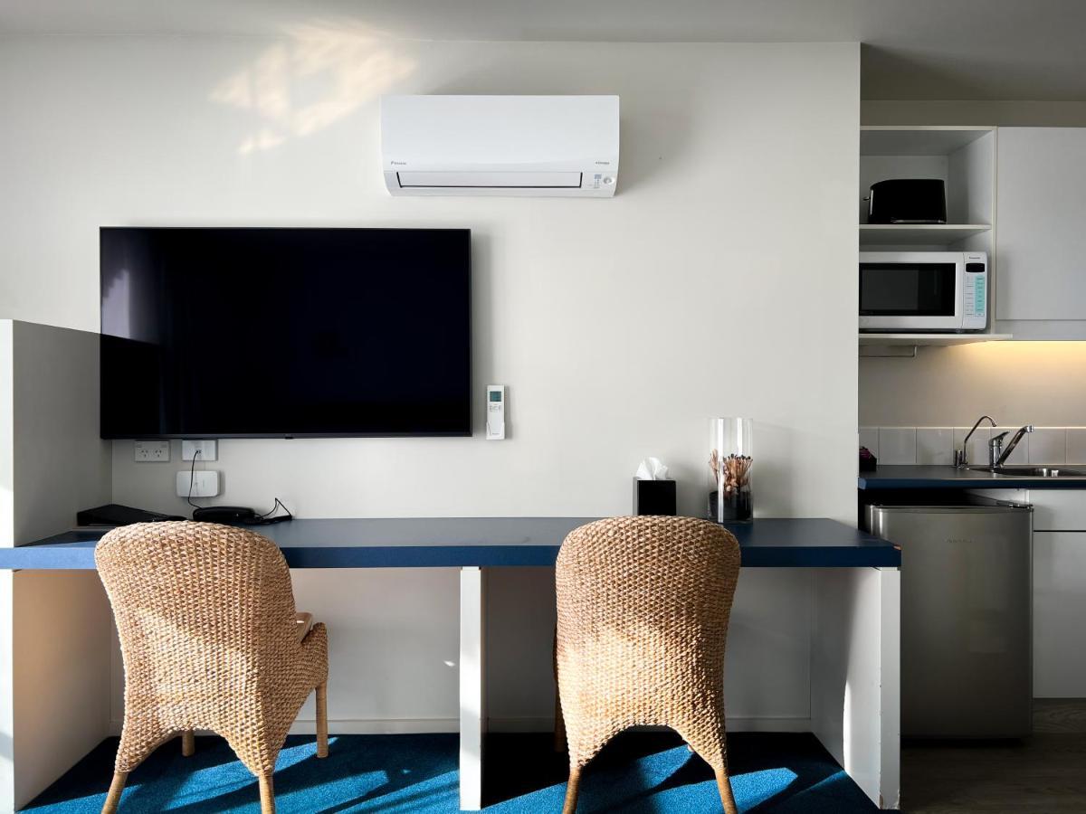 Beaches Nelson Exterior photo A wall mounted air conditioner in a hotel room